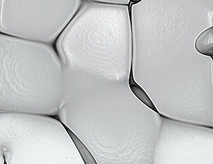 Textura bianca e lucida con forme irregolari che creano un effetto astratto e tridimensionale.